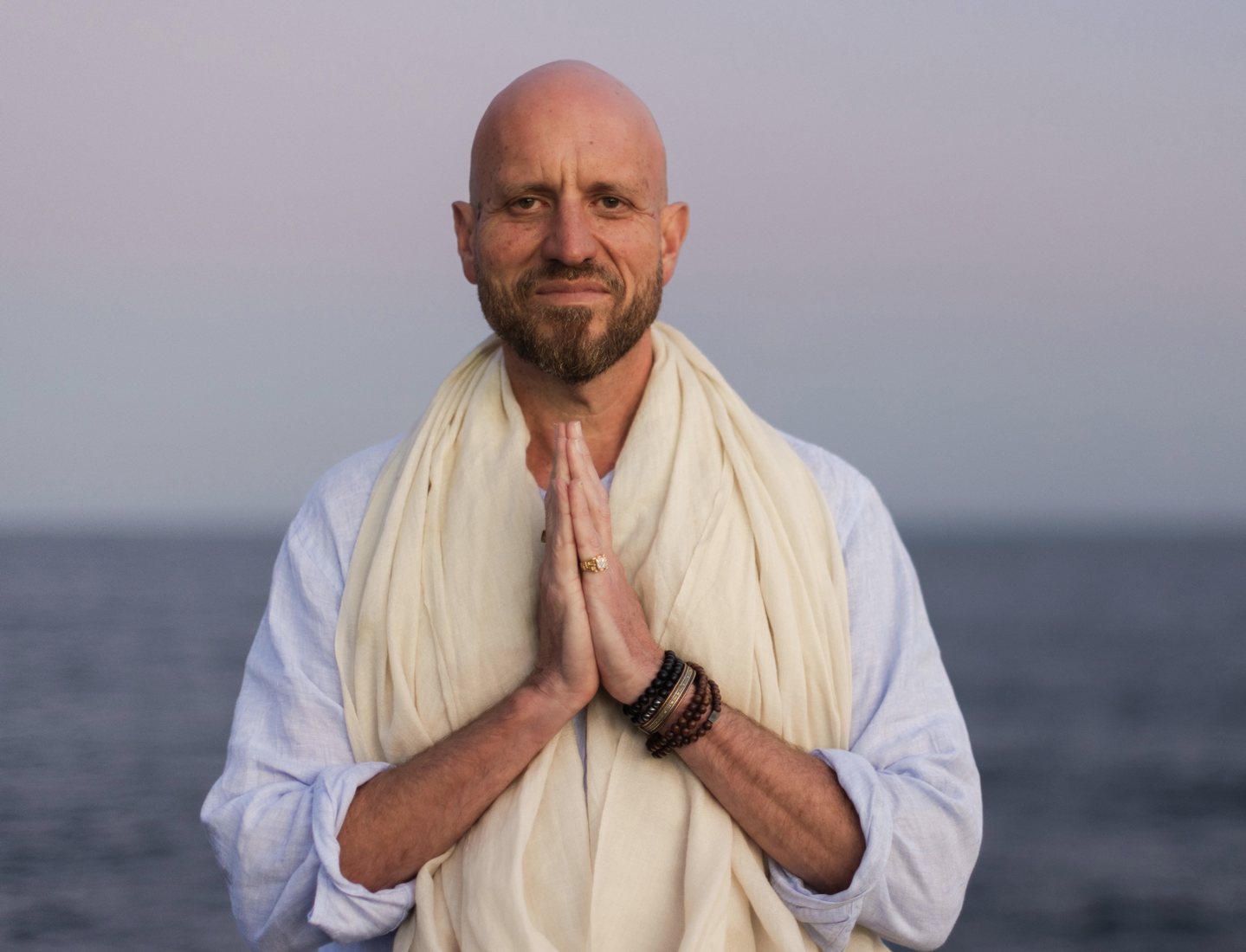 Geoff Rupp in meditation by the ocean, founder of The Turning Point program