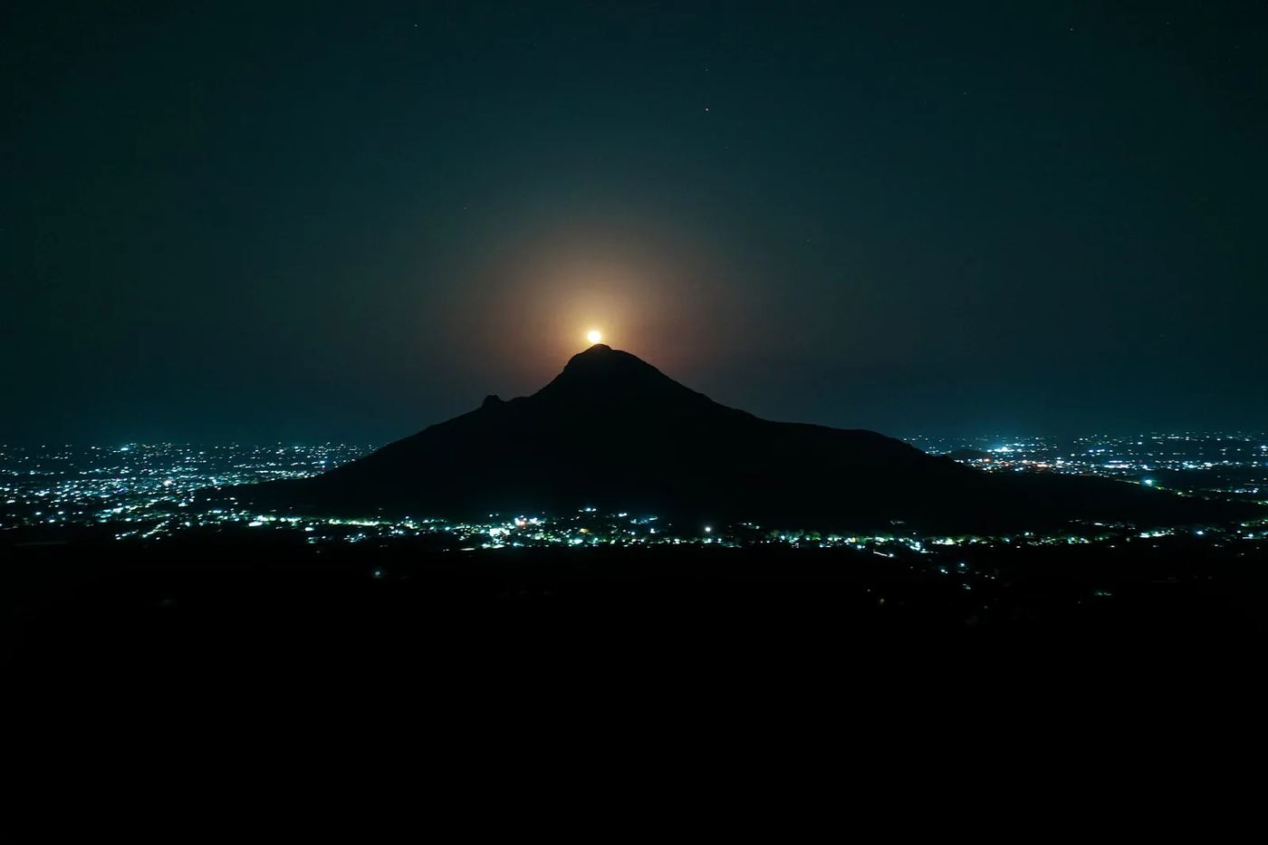 Arunachala mountain Tiruvannamalai at sunrise — sacred site of the Girivalam barefoot walk